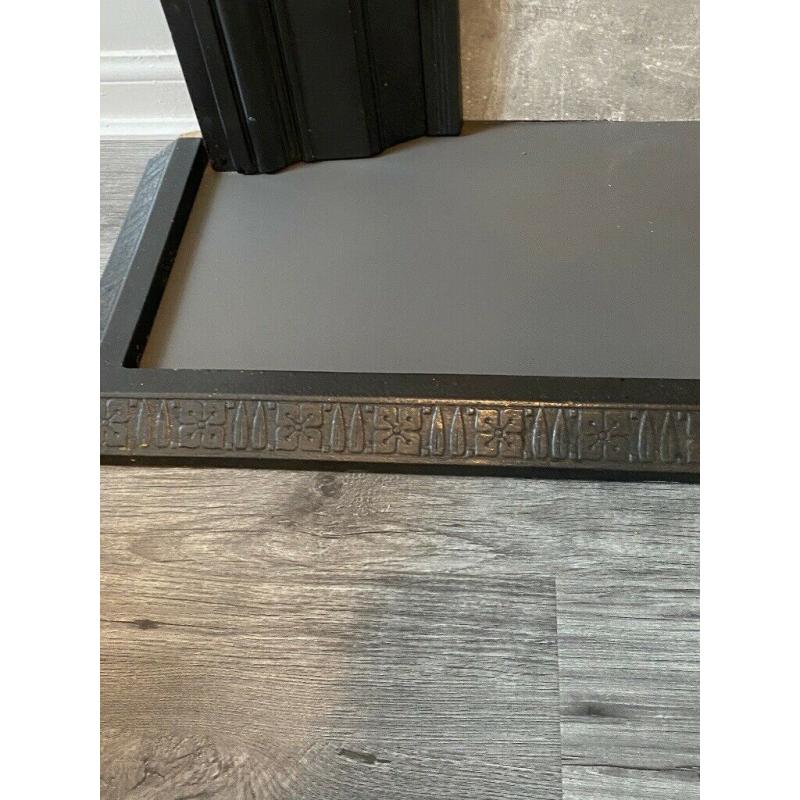 Beautiful black original cast iron fireplace with fender! Refurbished and in good condition