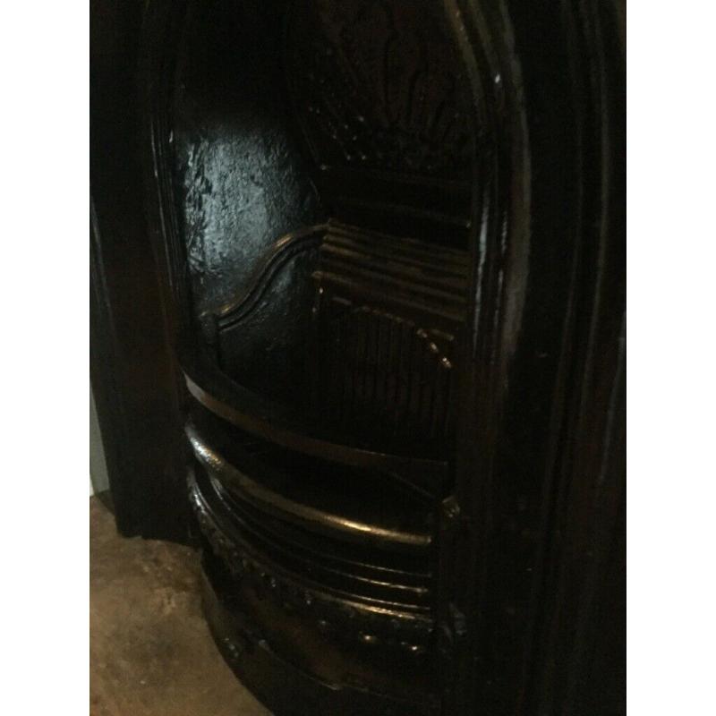 Victorian style cast iron fireplace / insert with mantlepiece