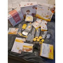 Medela swing breast pump essential pack