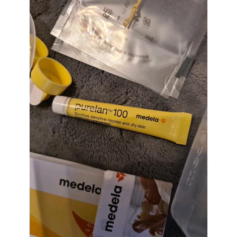 Medela swing breast pump essential pack