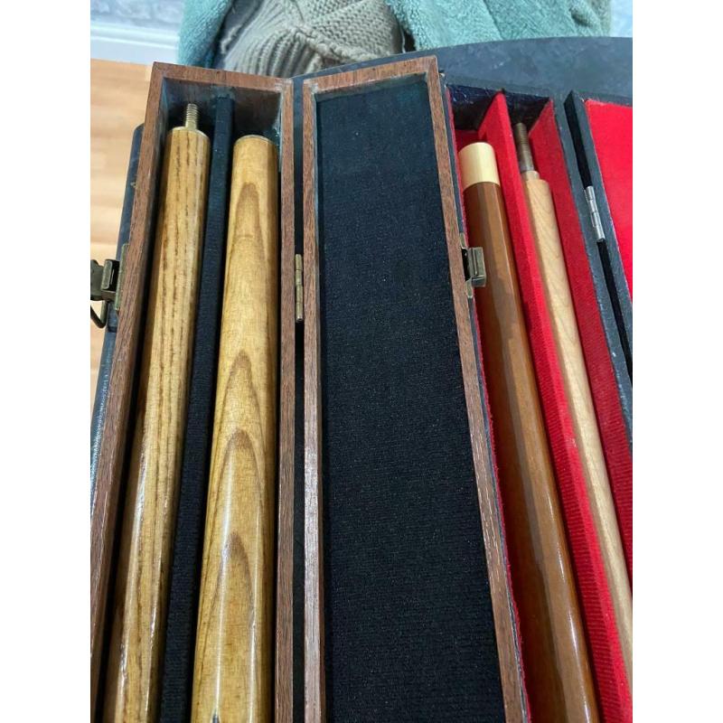 Three snooker pool cues with cases