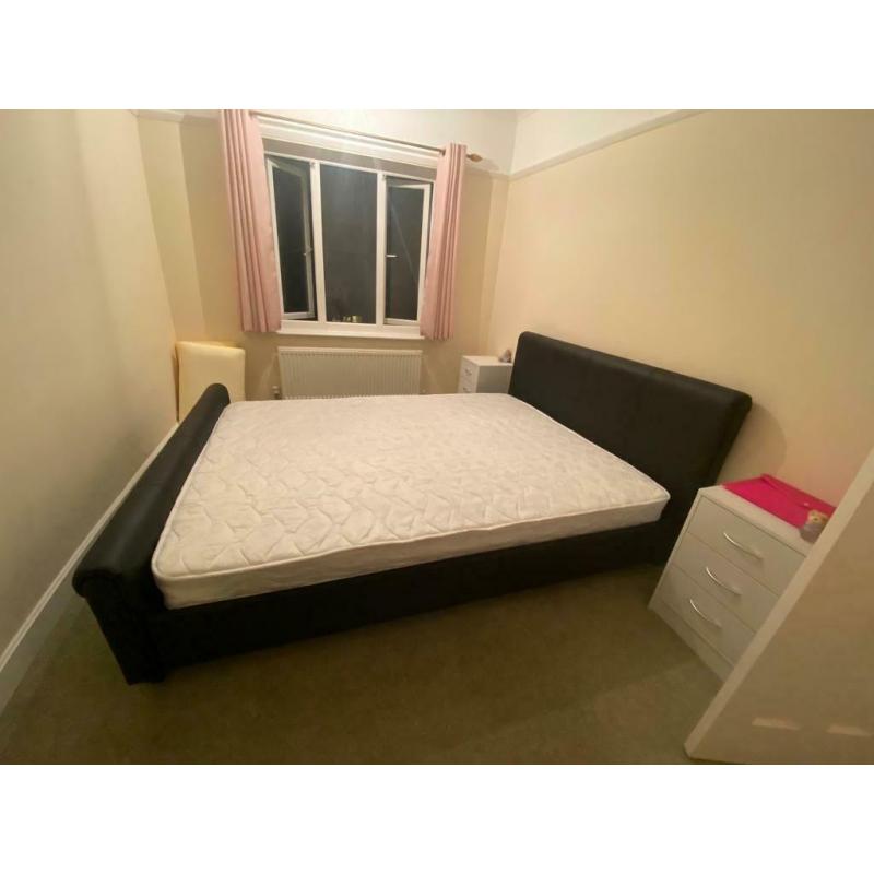 King Size Bed with a free mattres