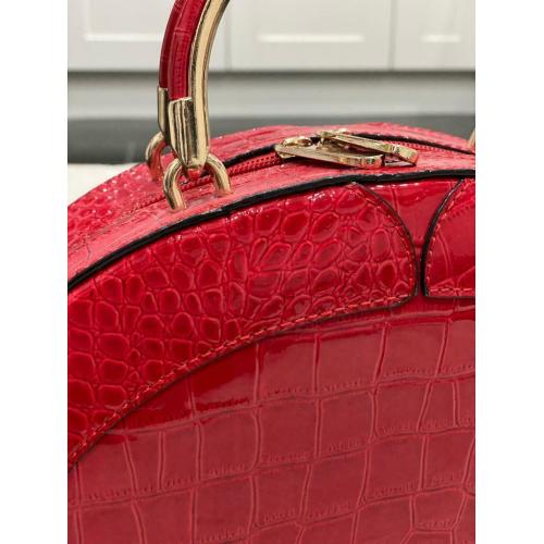Ladies red mock croc handbag