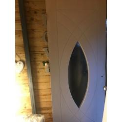 Solid wood and shaped glass internal door