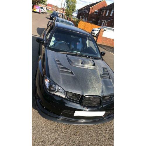 Seibon carbon 06-07 WRX STI Hood