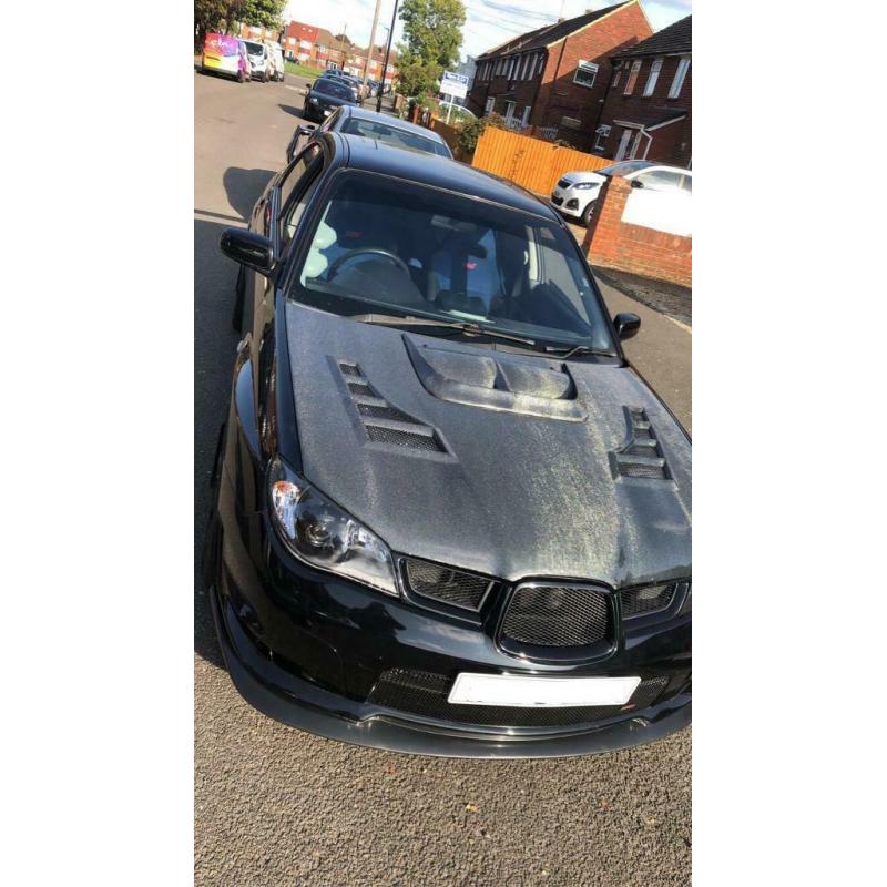 Seibon carbon 06-07 WRX STI Hood