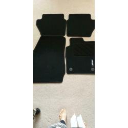 Genuine Ford fiesta material mats x4 set. Brand new !!!