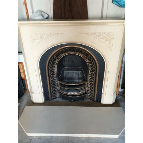 Cast iron fire place with gas fire