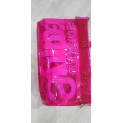 Neon pink transparent plastic Superdry bag