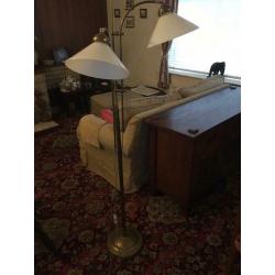 brass reading lights with two shades.