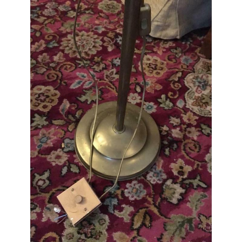 brass reading lights with two shades.