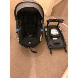 Stokke IZi sleep car seat with base.