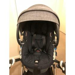 Stokke IZi sleep car seat with base.