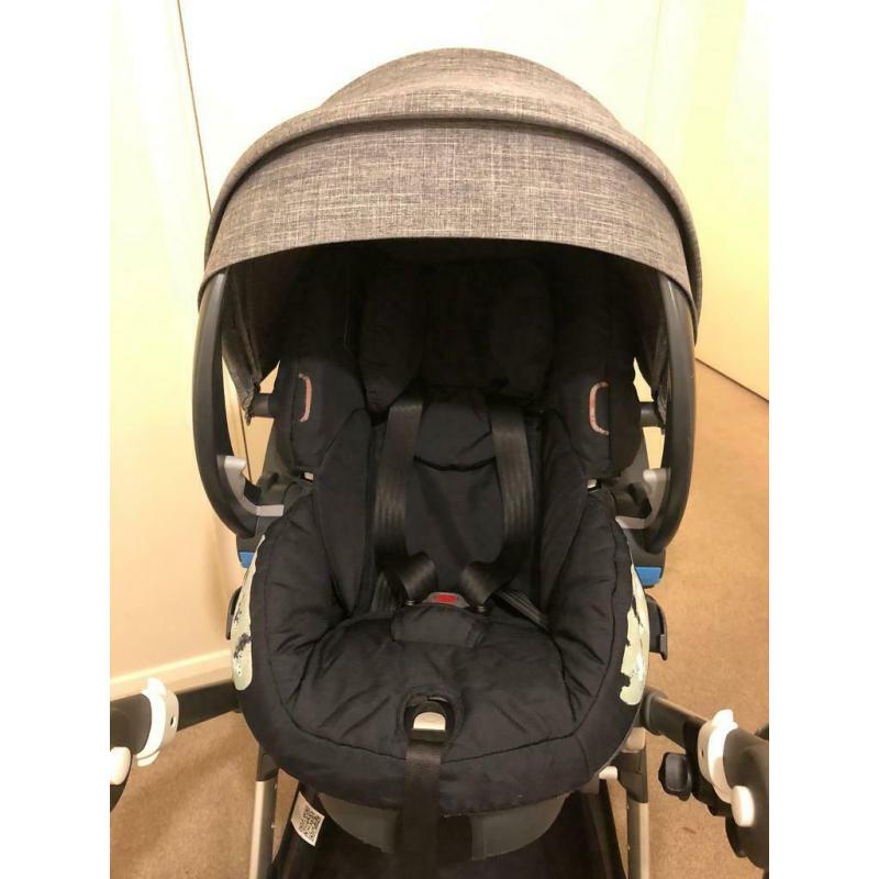 Stokke IZi sleep car seat with base.