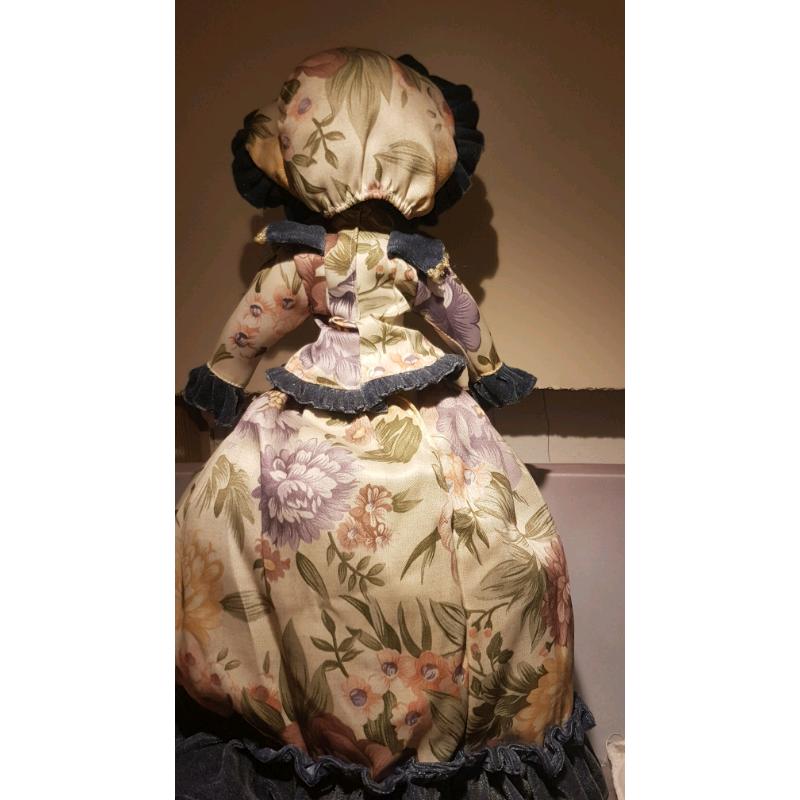 Porcelain Doll on Stand
