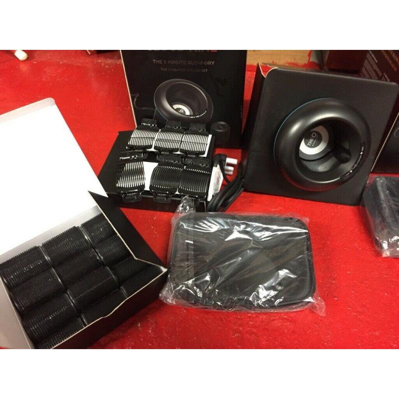 Two sets of Cloud Nine Heated Rollers. Brand Nee still in boxes