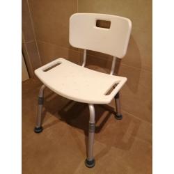 Shower seat with back rest