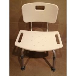 Shower seat with back rest