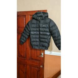 Nike boys coat black 10 to 12.