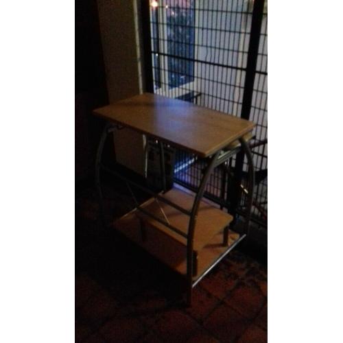 A free desk, smallish and good for a laptop as well, good condition