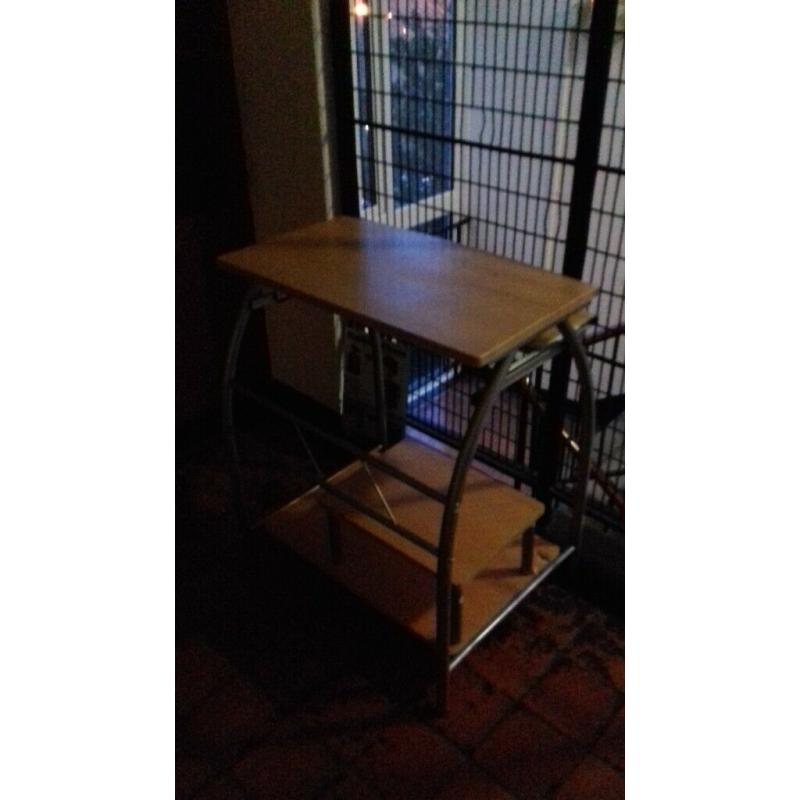 A free desk, smallish and good for a laptop as well, good condition