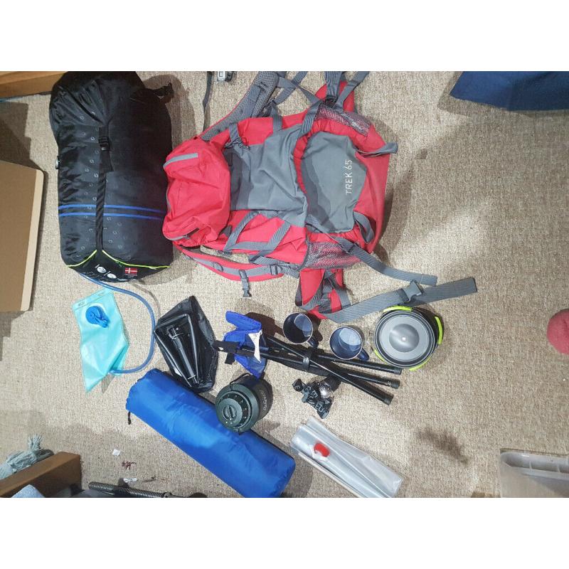 Camping gear: backpack, cooking gear, water bladder, double sleeping bag, lights, sleeping mat