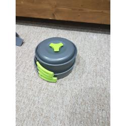 Camping gear: backpack, cooking gear, water bladder, double sleeping bag, lights, sleeping mat