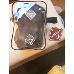 For sale black pair horses dressage bandages in zip bag label on large