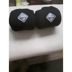 For sale black pair horses dressage bandages in zip bag label on large