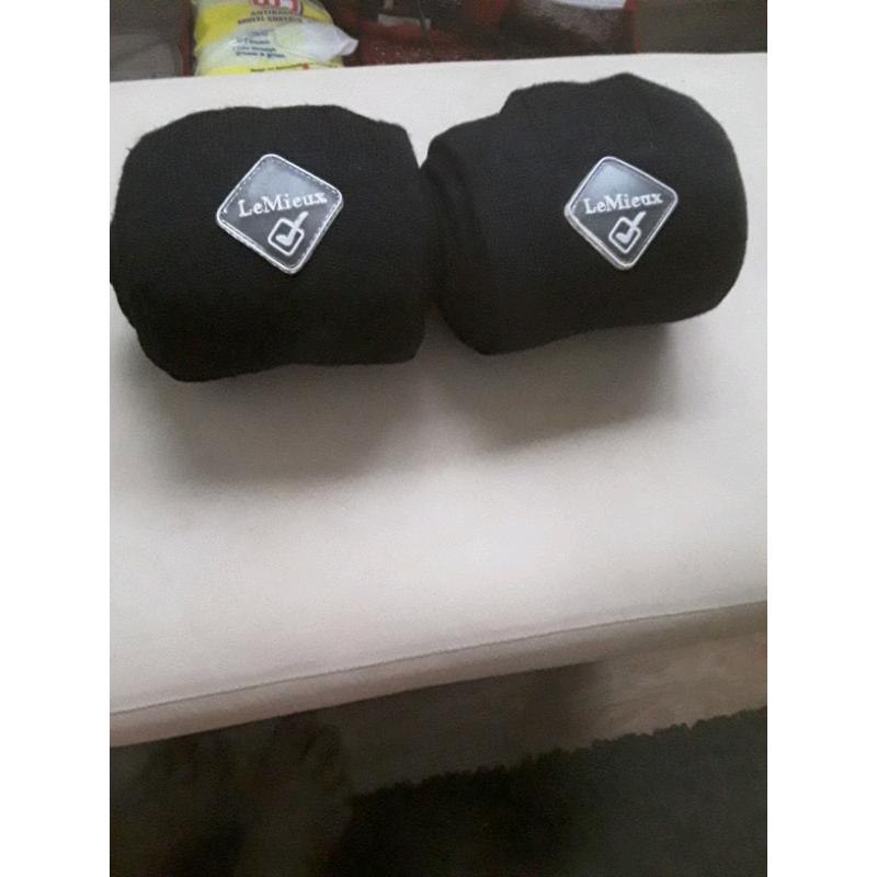 For sale black pair horses dressage bandages in zip bag label on large