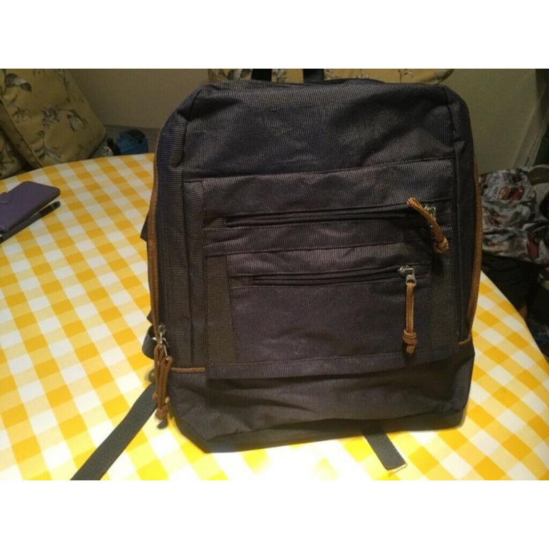 Brand new backpack.Lots of pockets and 4 zippers