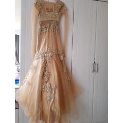 Gold gown for sale, size 8 in great condition.