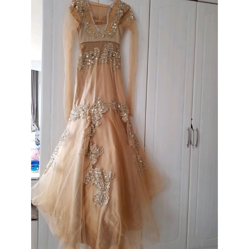 Gold gown for sale, size 8 in great condition.
