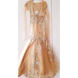 Gold gown for sale, size 8 in great condition.