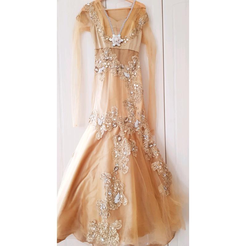 Gold gown for sale, size 8 in great condition.