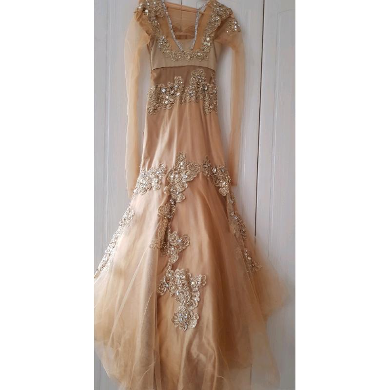 Gold gown for sale, size 8 in great condition.