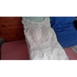 Cream wedding dress size 10/12 and needs someone at least 5ft9ins tall
