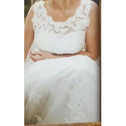 Cream wedding dress size 10/12 and needs someone at least 5ft9ins tall