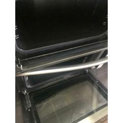 Stainless steel new world 70cm by 60cm integrated grill & gas ovens good condition with guarantee