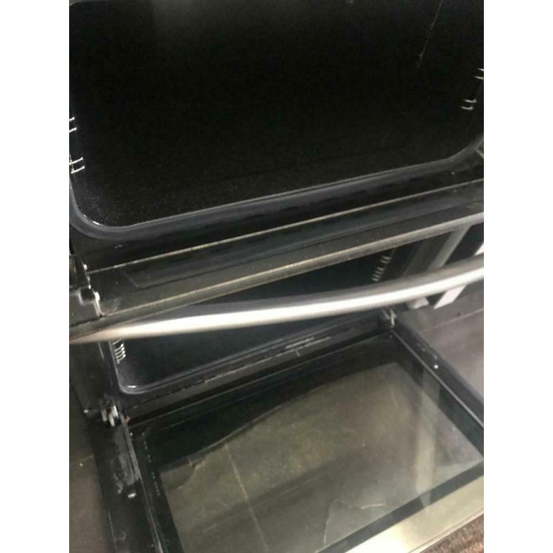 Stainless steel new world 70cm by 60cm integrated grill & gas ovens good condition with guarantee