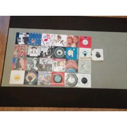 25 vinyl 7" singles from 70's & 80's some rare and highly collectable.