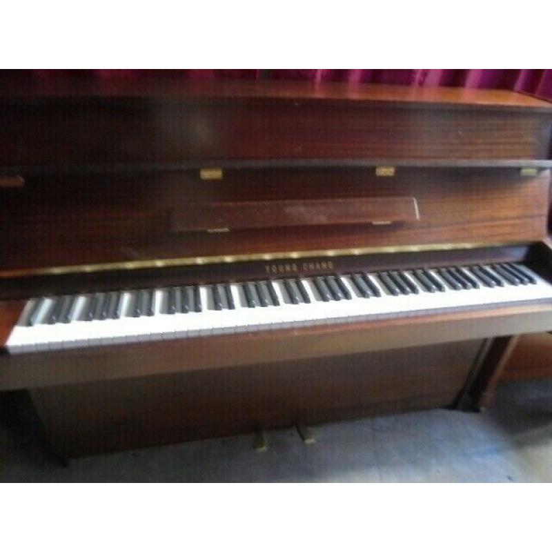 upright piano by young chang 18 year old