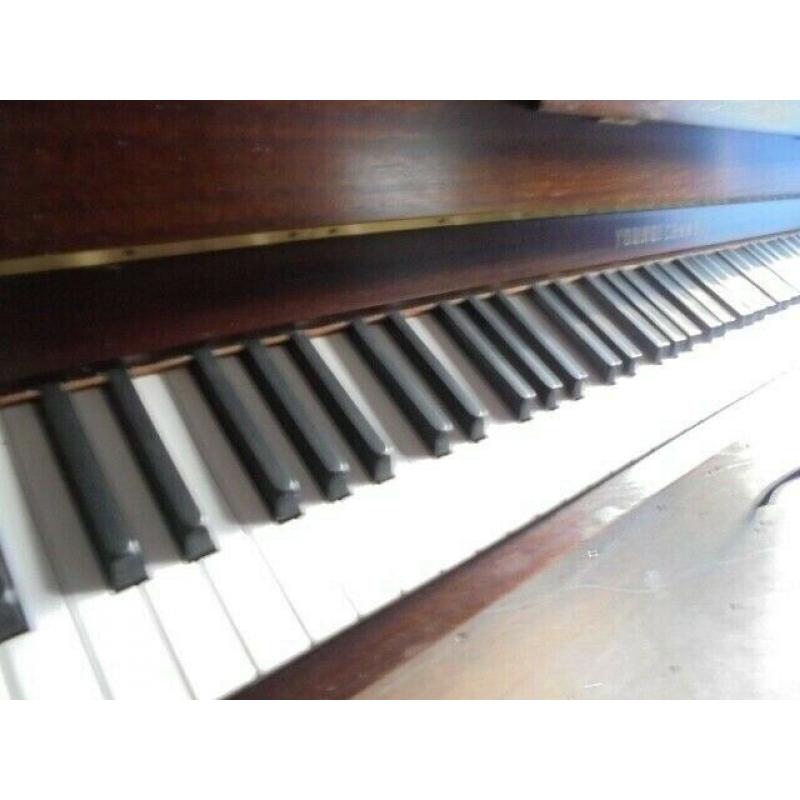 upright piano by young chang 18 year old