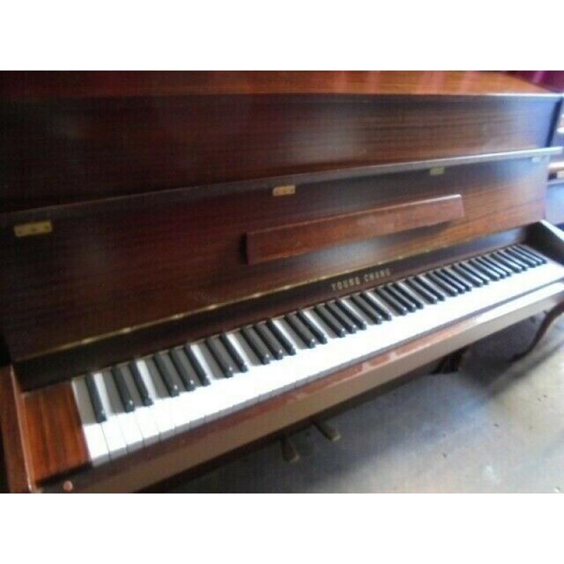 upright piano by young chang 18 year old