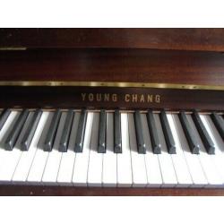 upright piano by young chang 18 year old