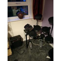 Alesis nitro mesh drum kit with amp