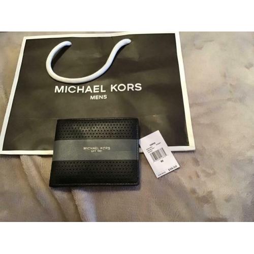 MICHEAL KORS MENS WALLET GENUINE.