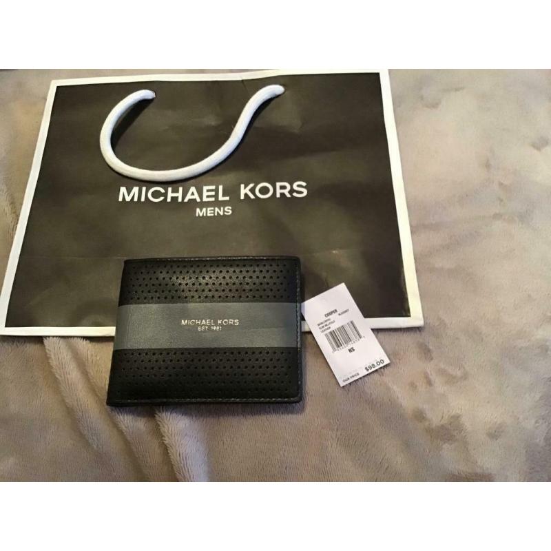 MICHEAL KORS MENS WALLET GENUINE.