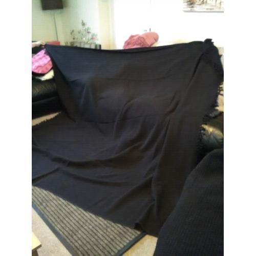 Two large black throws
