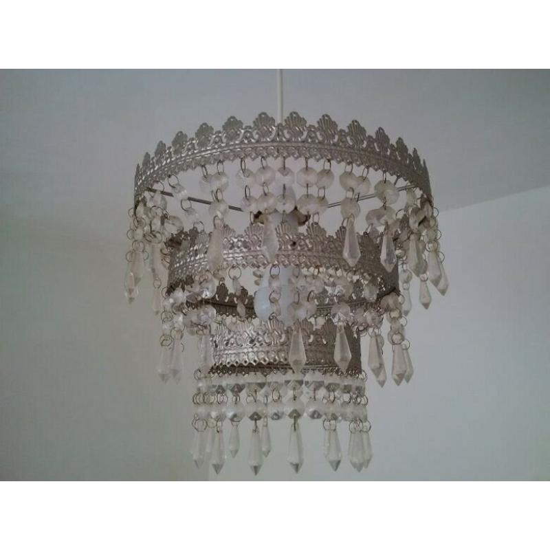 two beautiful and elegant ceiling light shades or fittings